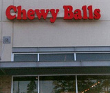 Chewy Balls Shop Billboard Sign